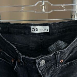 Zara the skinny in pearl black with distressed bottoms